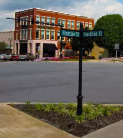Road in foreground, building in background